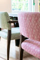Chairs upholstered in Belge by Barron & Larcher, a playful printed linen featuring multicoloured dotted geometrics. Photography by Scott Dennis.